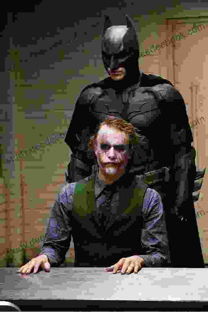 A Color Still From The Dark Knight, Showing Christian Bale As Batman And Heath Ledger As The Joker Facing Off On A Rooftop. The Science Of Sci Fi Cinema: Essays On The Art And Principles Of Ten Films