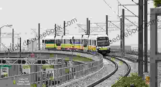 A Photo Of A Dallas Light Rail Train Passing Through The City Dallas Light Rail Train Business Directory Travel Guide Red Orange Lines (2024)