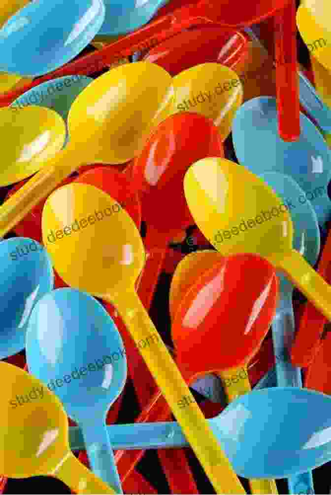 A Young Child Sitting At A Table, Surrounded By Colorful Plastic Spoons. SpoonFed: My Life With The Spoons