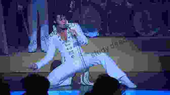 Elvis Presley In A White Suit Performing Suspicious Minds 25 Best Songs Of Elvis Presley